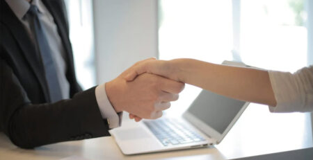 Two people shaking hands