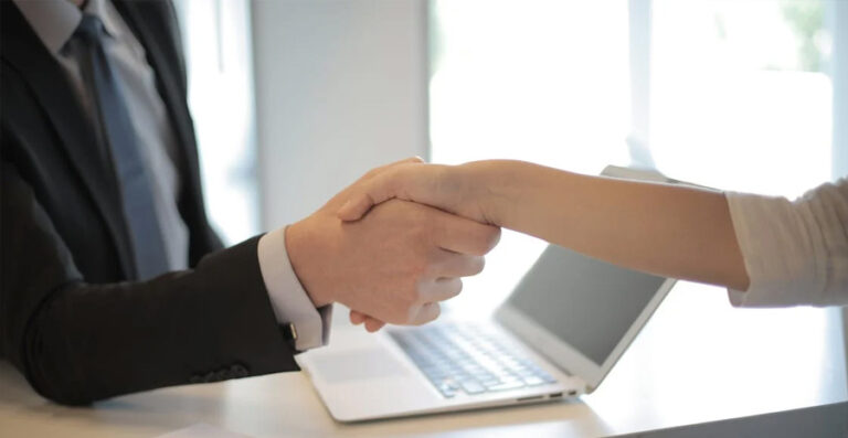 Two people shaking hands