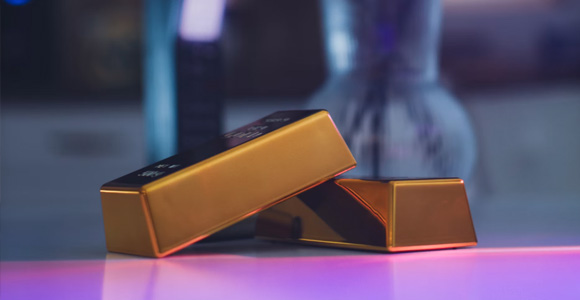 Photo of two gold bars on a table